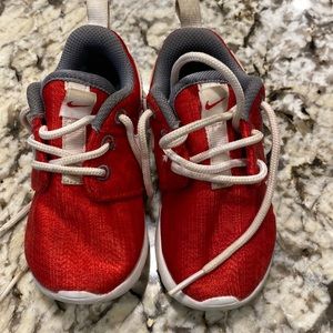 Nike child’s red and white Tennis shoe size 6c